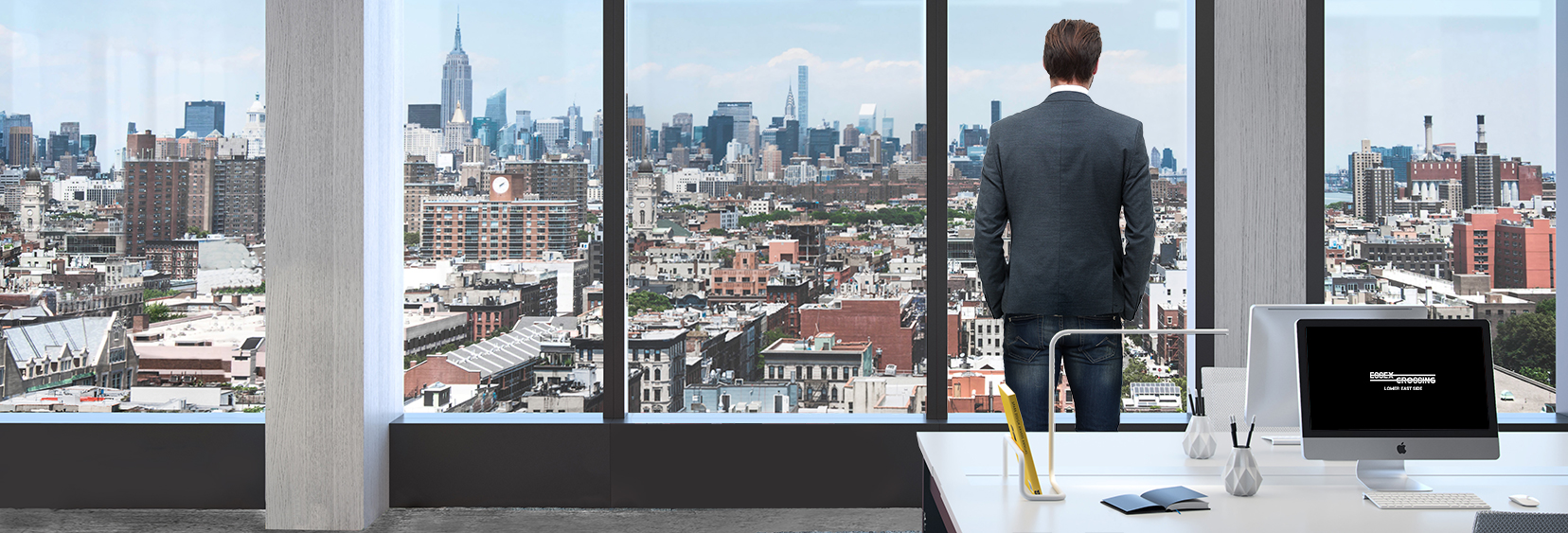 Man looking out at office view